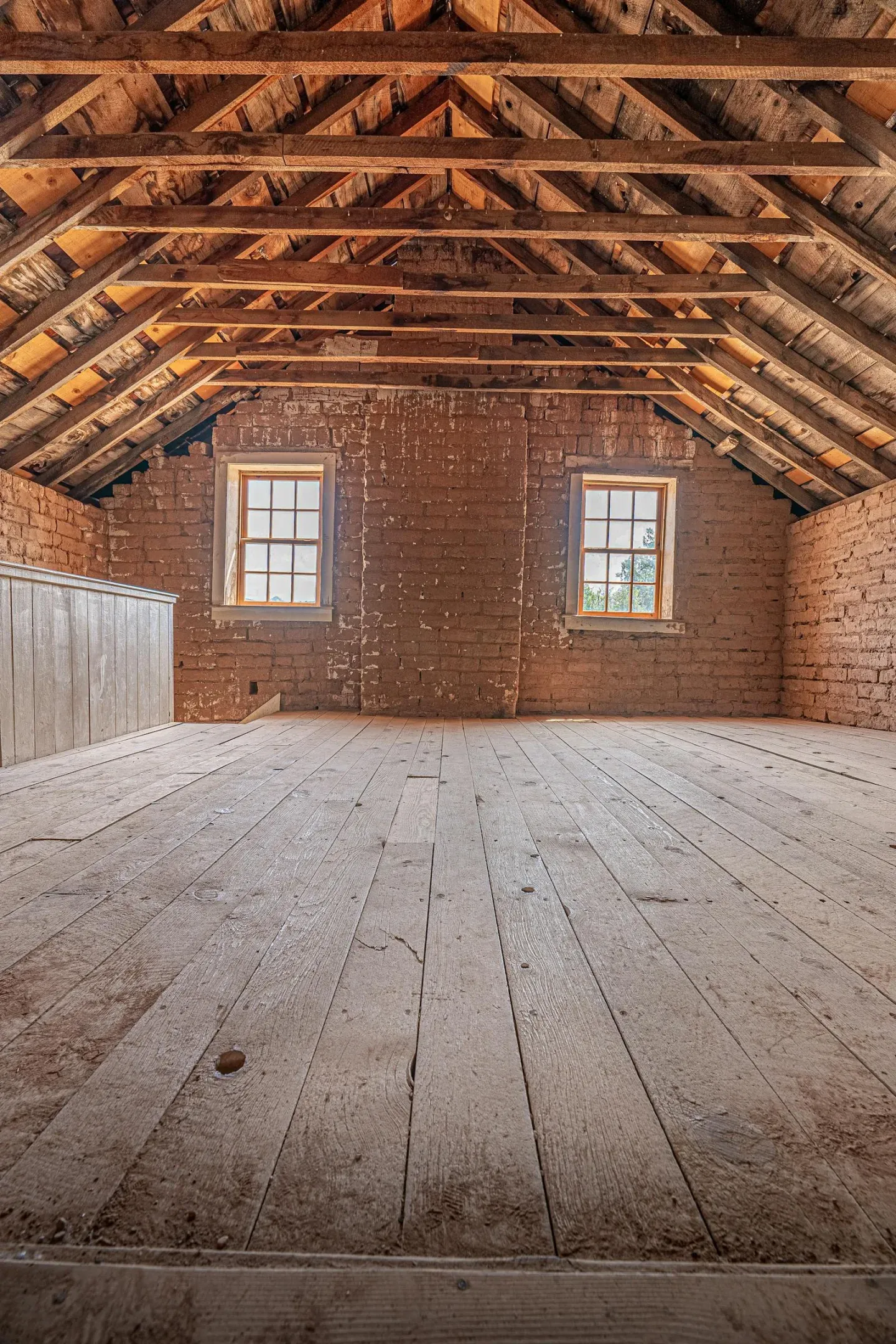 Old attic insulation being removed