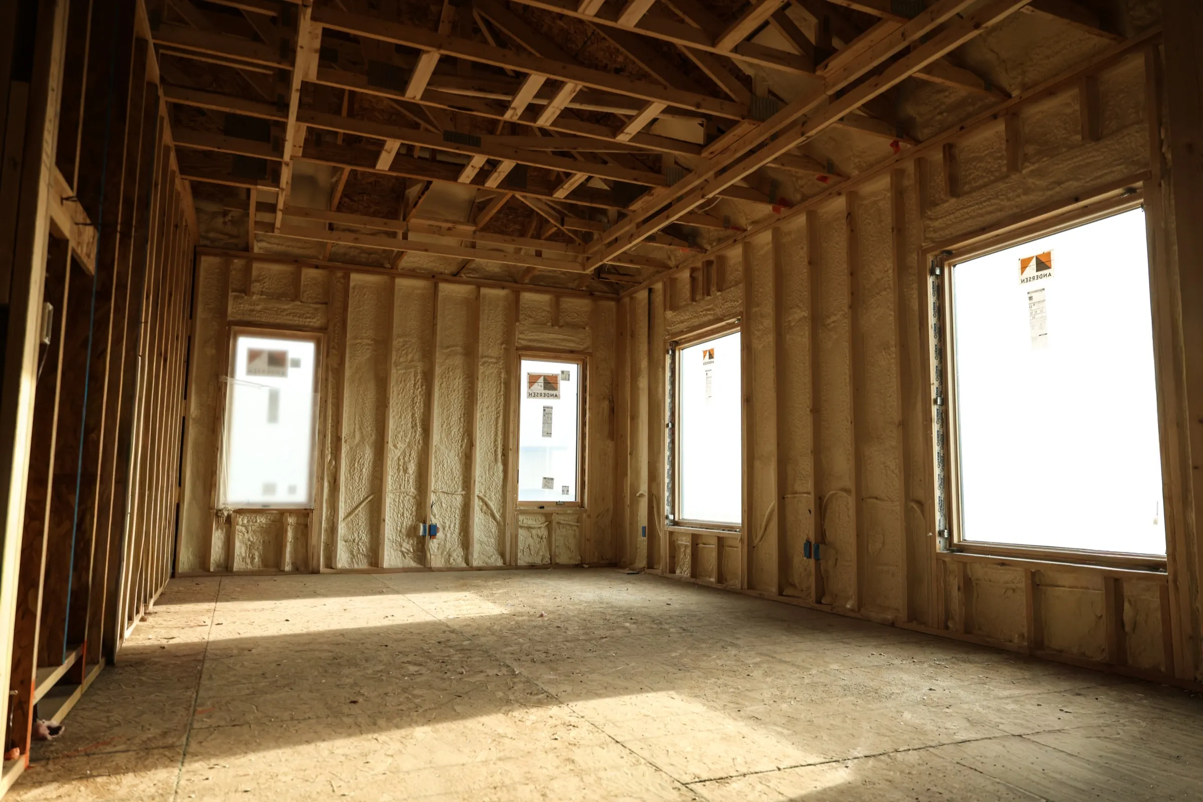 Spray foam insulation applied to wall cavities